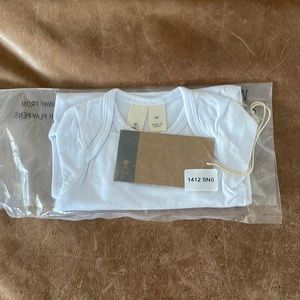 Kyte baby snow long sleeve body suit